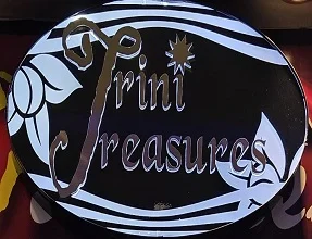 Trini Treasures logo